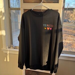Black Sweatshirt with Colorful Heart Design